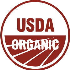 USDA Organic seal depicting certified organic farming text within a circular design.